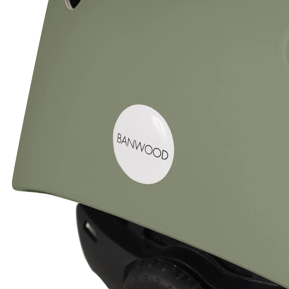 Kid wearing Banwood Classic Helmet Matte Forest Green