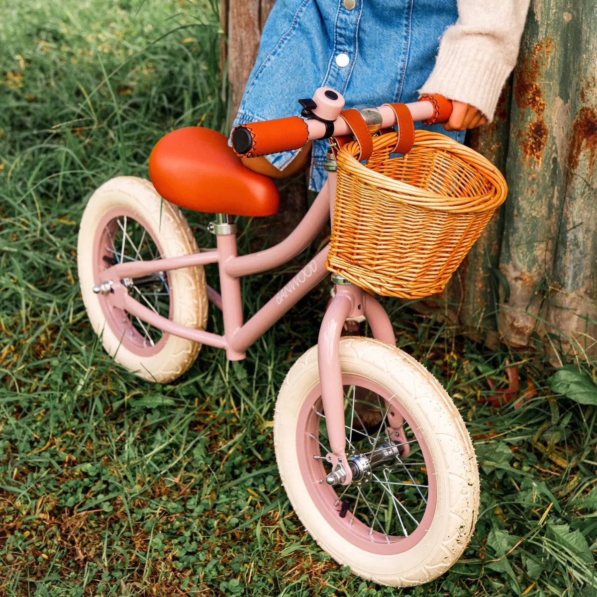 Dusty Pink Banwood balance bike for kids ages 2-5 — side view
