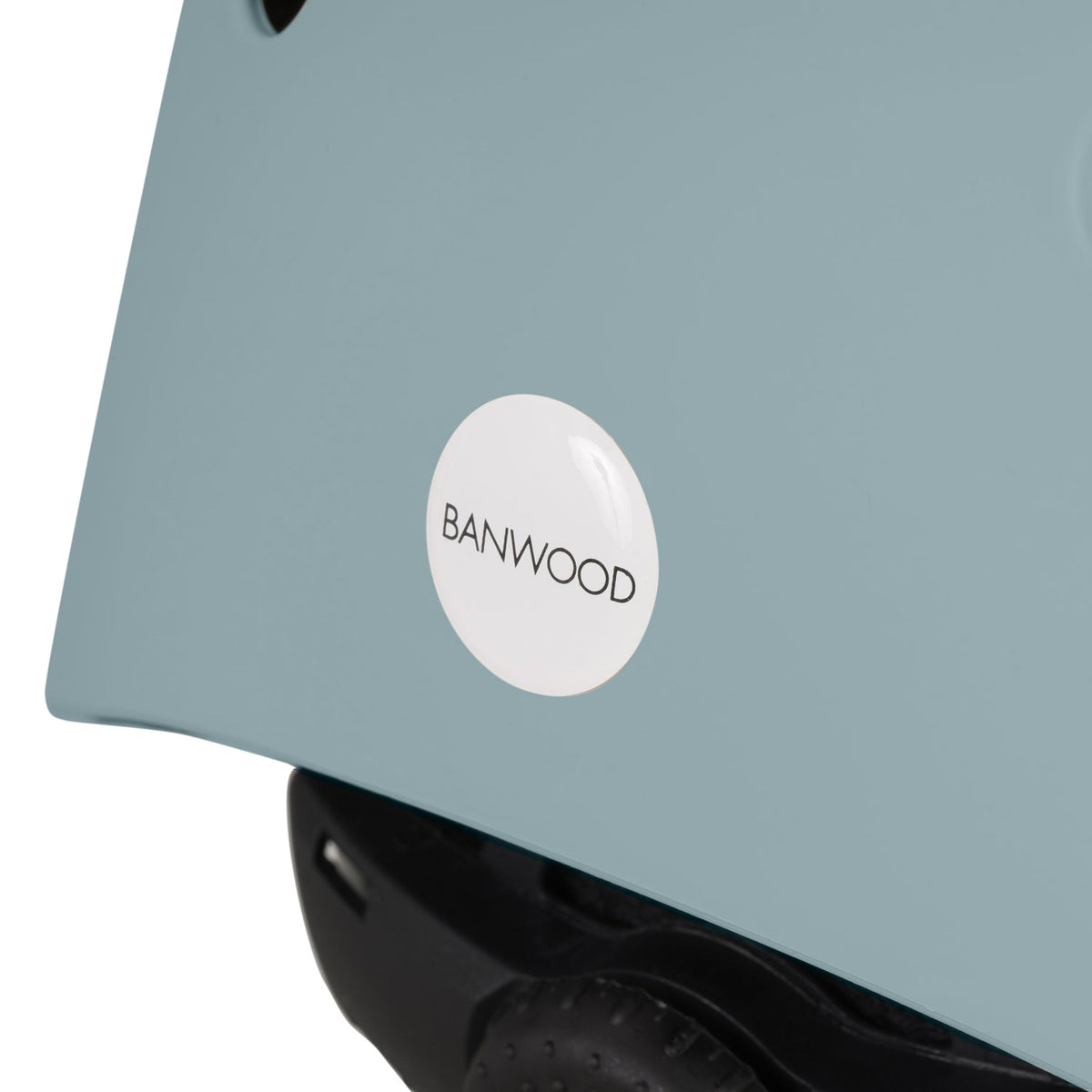 Kid wearing Banwood Eco Helmet Teal